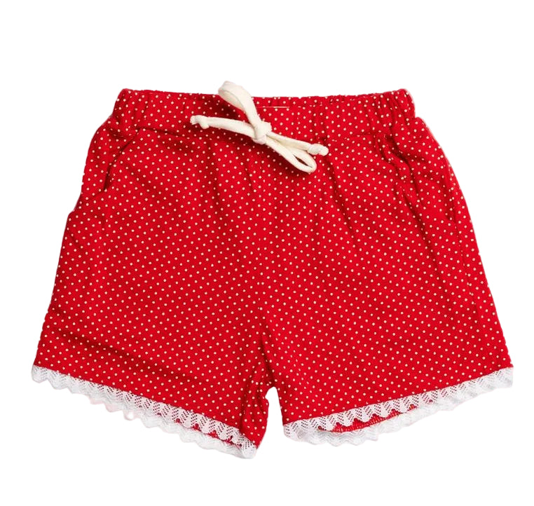 Red polka dot girls shorts with lace trim on a white background