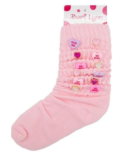 Pink sock with heart-shaped decorations on a white background