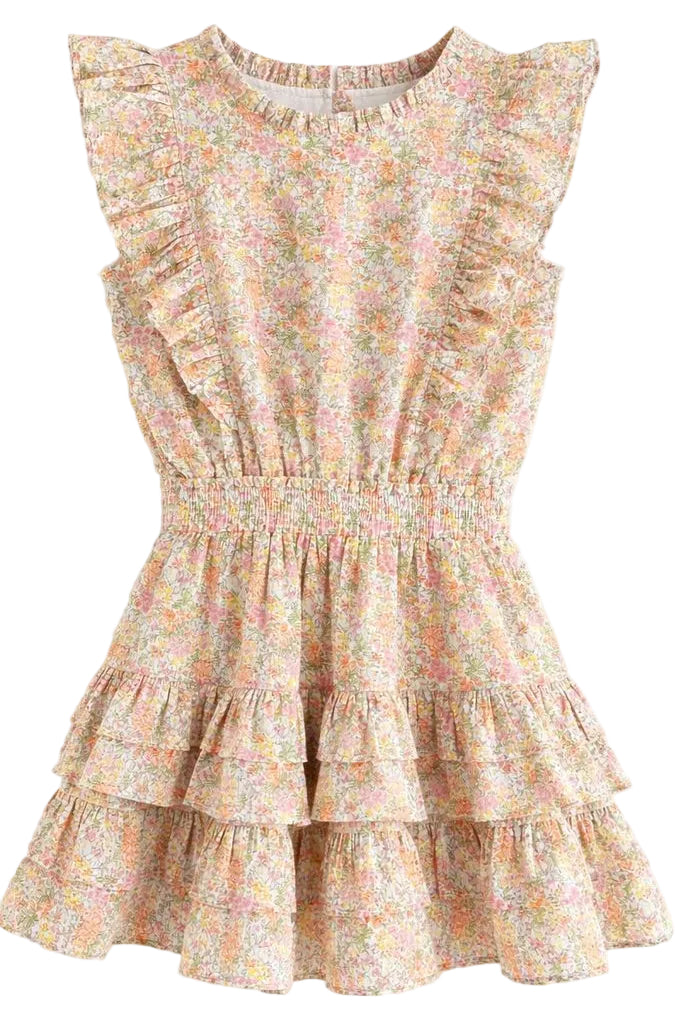 Floral dress with ruffled layers on a white background