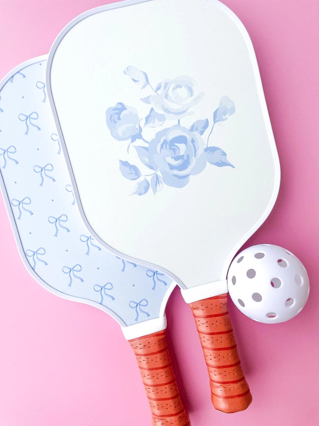 Pala de pickleball con lazo floral azul Coquette