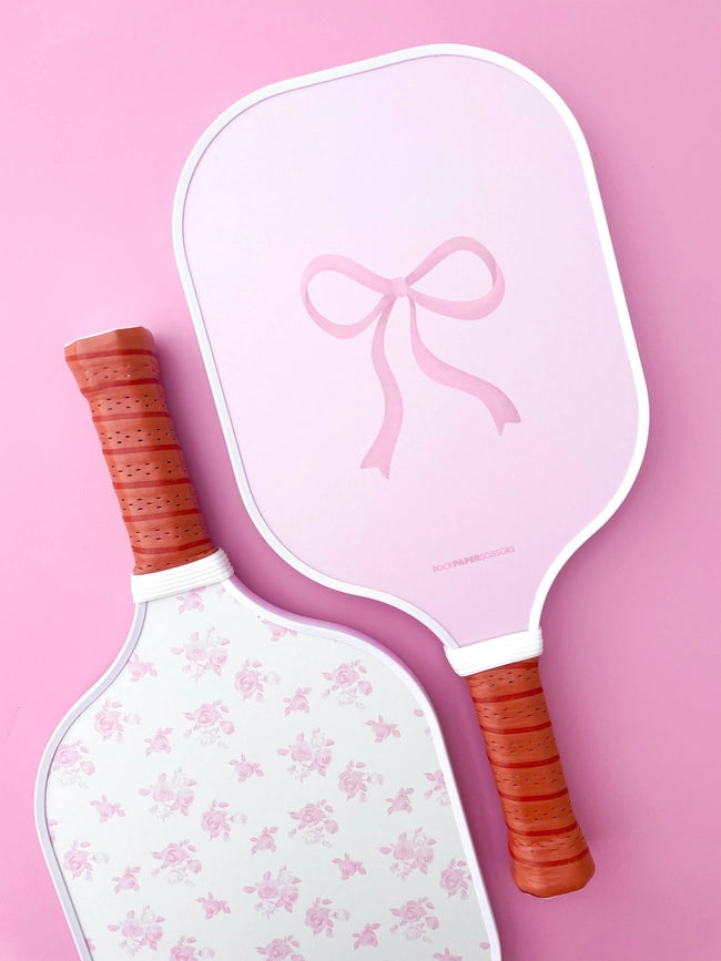 Pala de pickleball con lazo floral rosa de Coquette