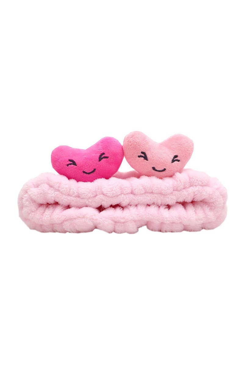 Diadema de spa de peluche con forma de corazón rosa