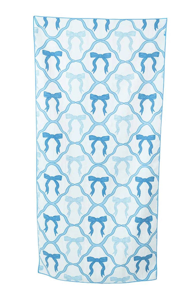 Beach Towel with blue bow pattern on a white background