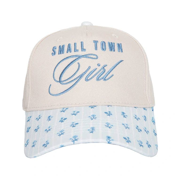 Cap with 'Small Town Girl' text on a white background