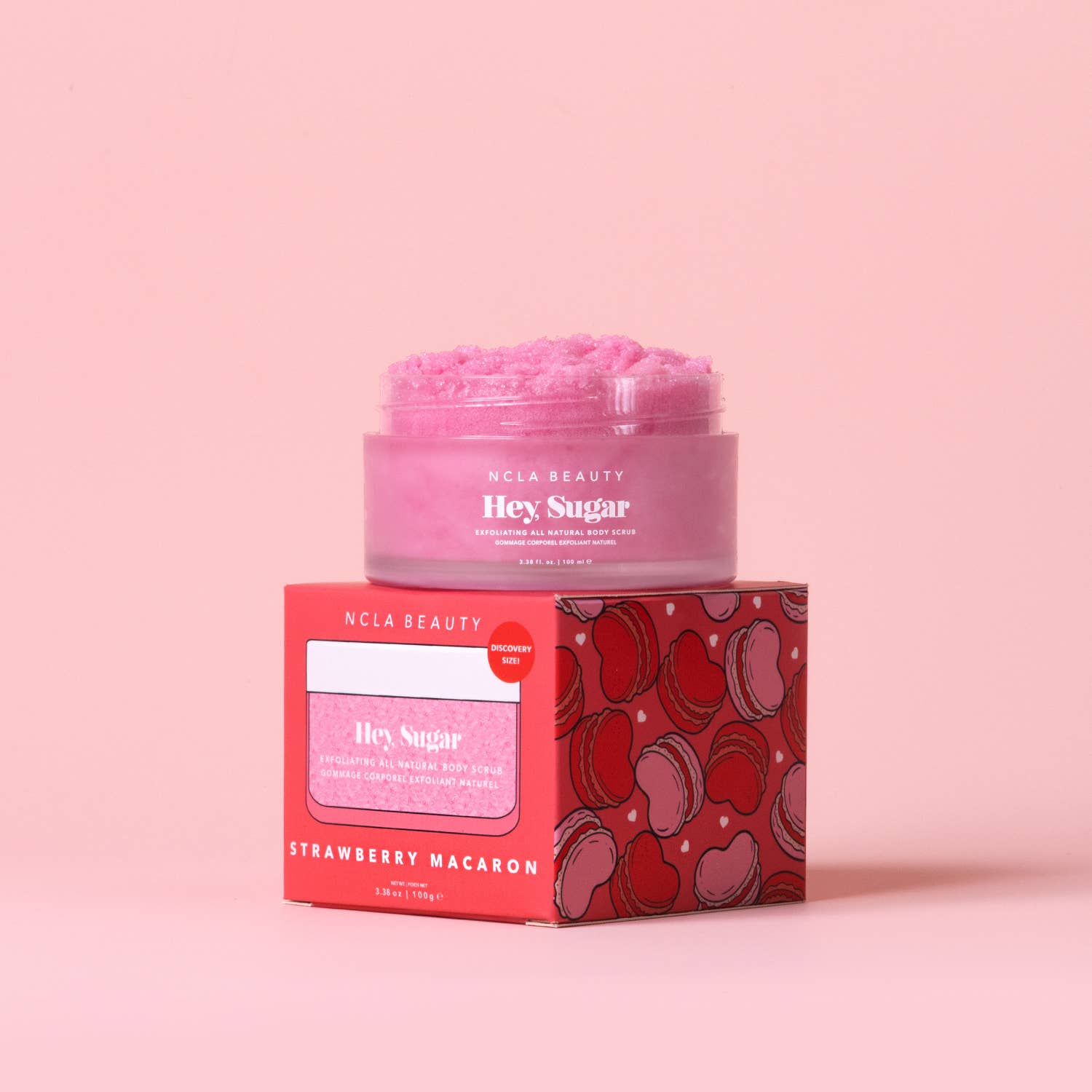 NCLA Beauty Hey Sugar Strawberry Macaron product with packaging on a pink background