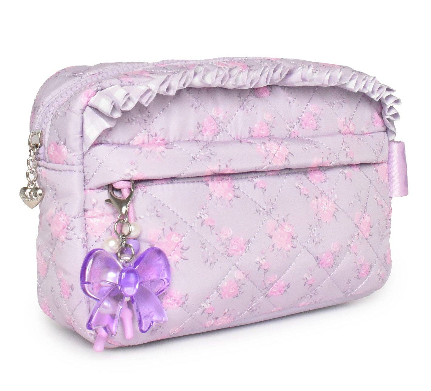 Pink quilted bag with a purple bow on a white background