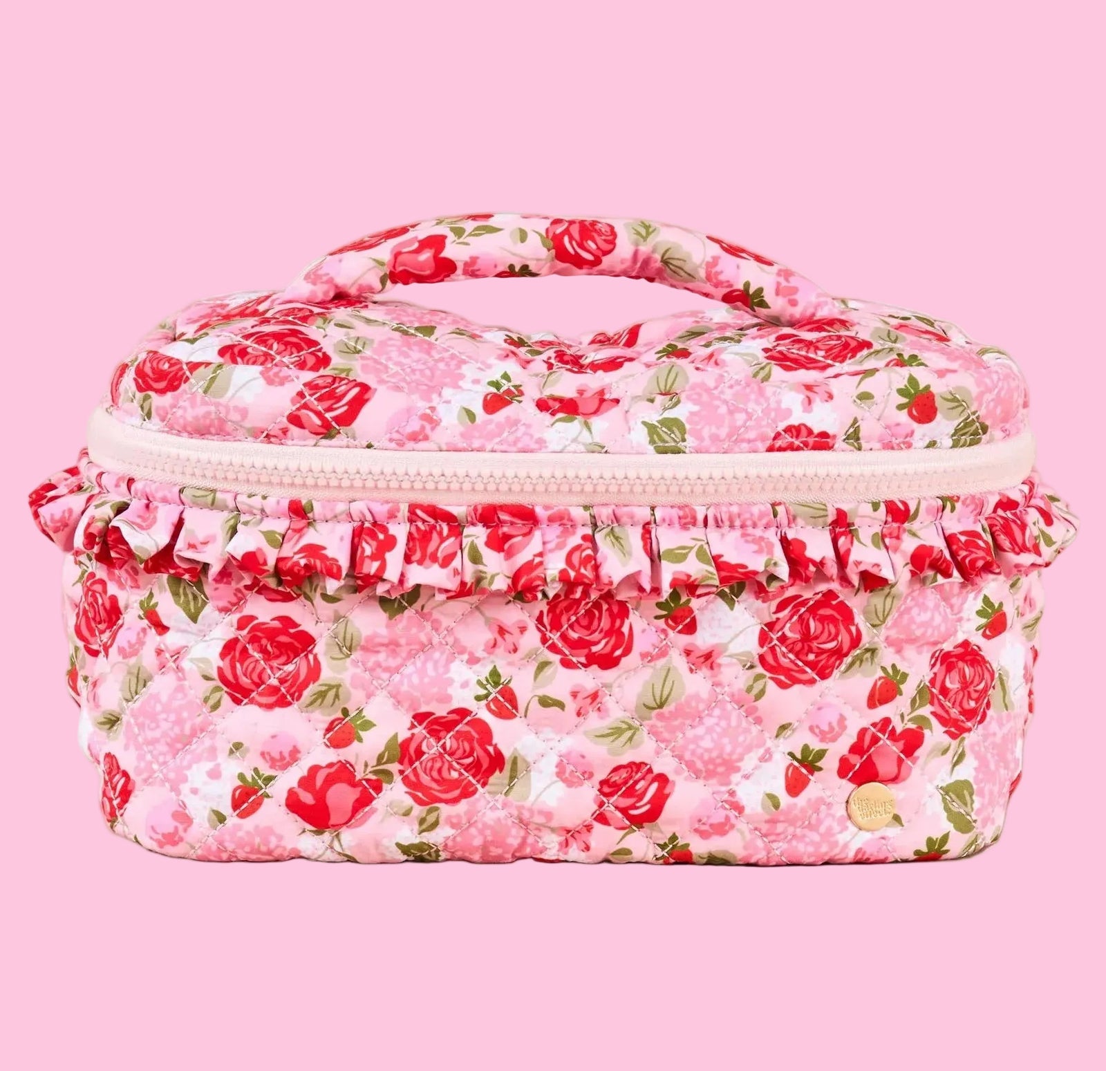 Floral patterned cosmetic bag on a beige background