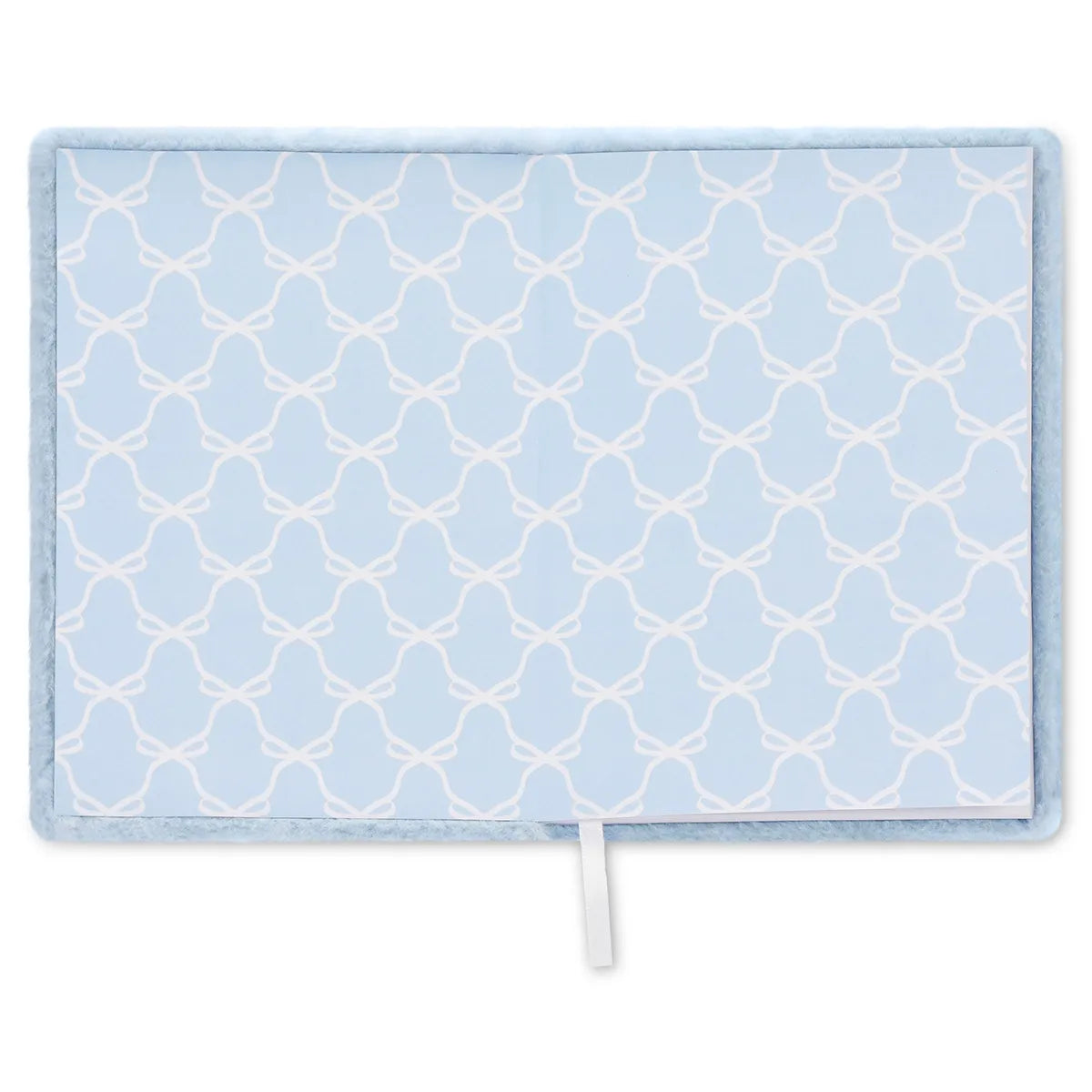 Inside cover of Blue Pearl Bow Journal with pale blue bow pattern