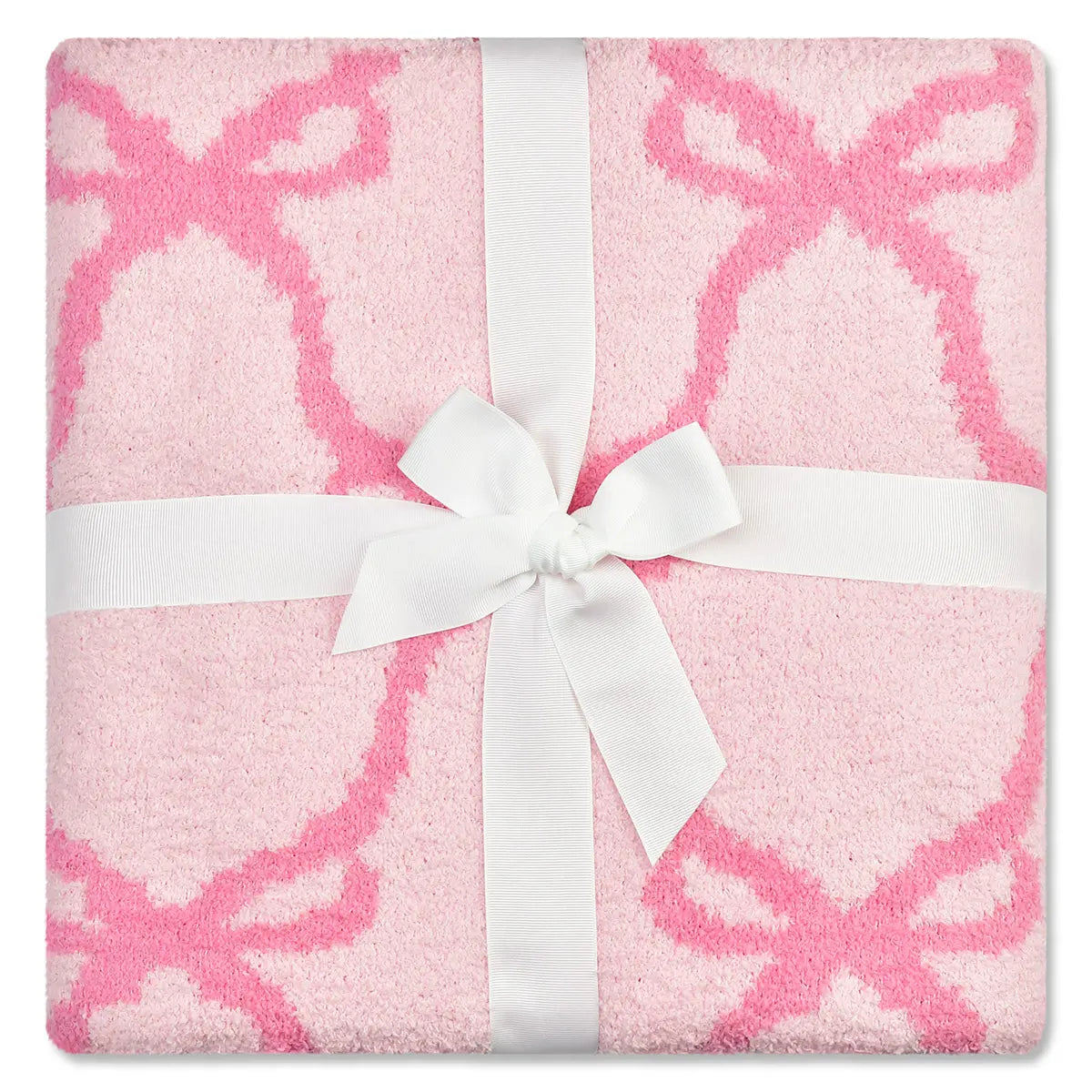 Iscream Sweet Trellis Bow Cozy Knit Blanket in pale pink with brighter pink bows, folded with a white ribbon