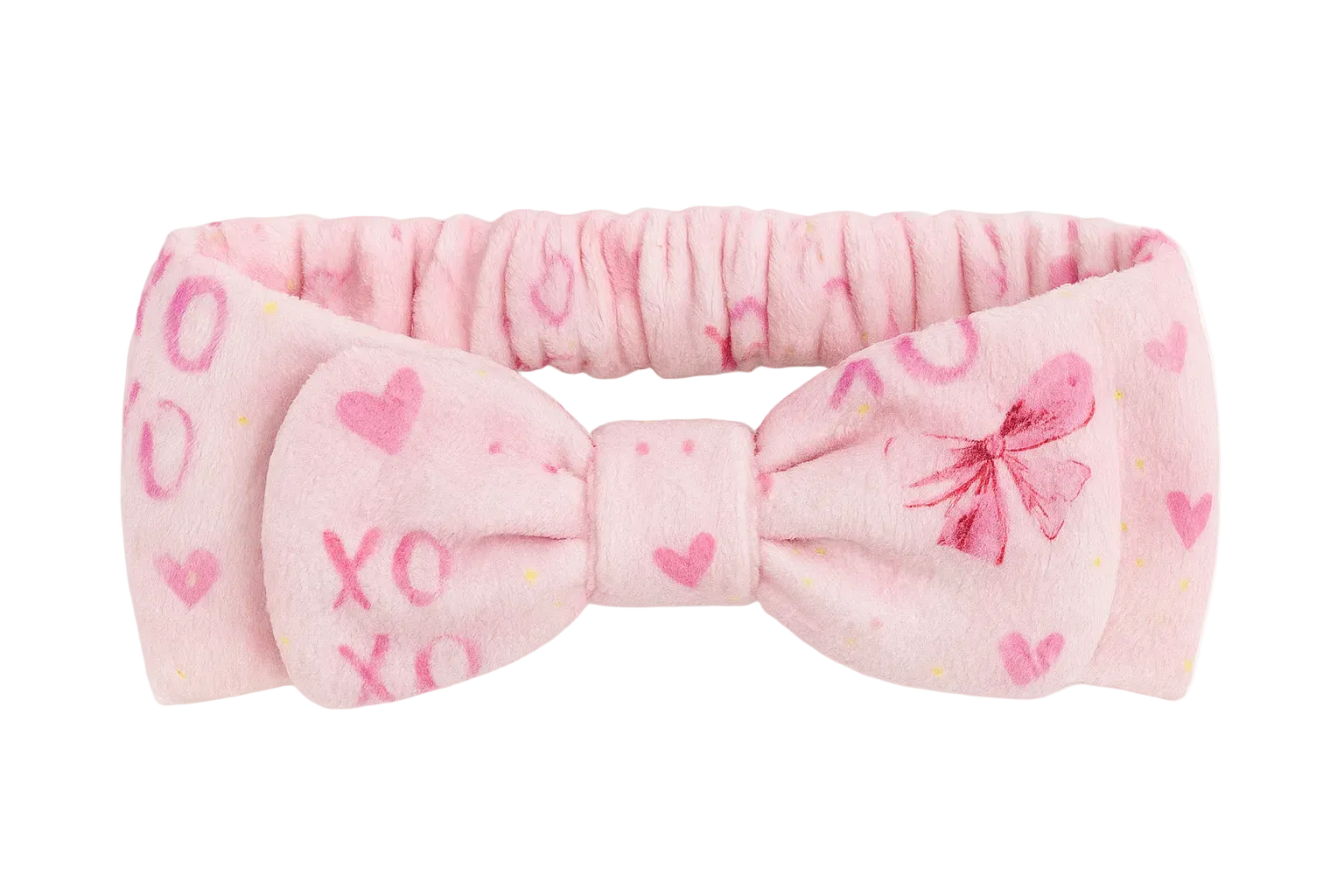 Pink headband with bow and heart designs on a white background