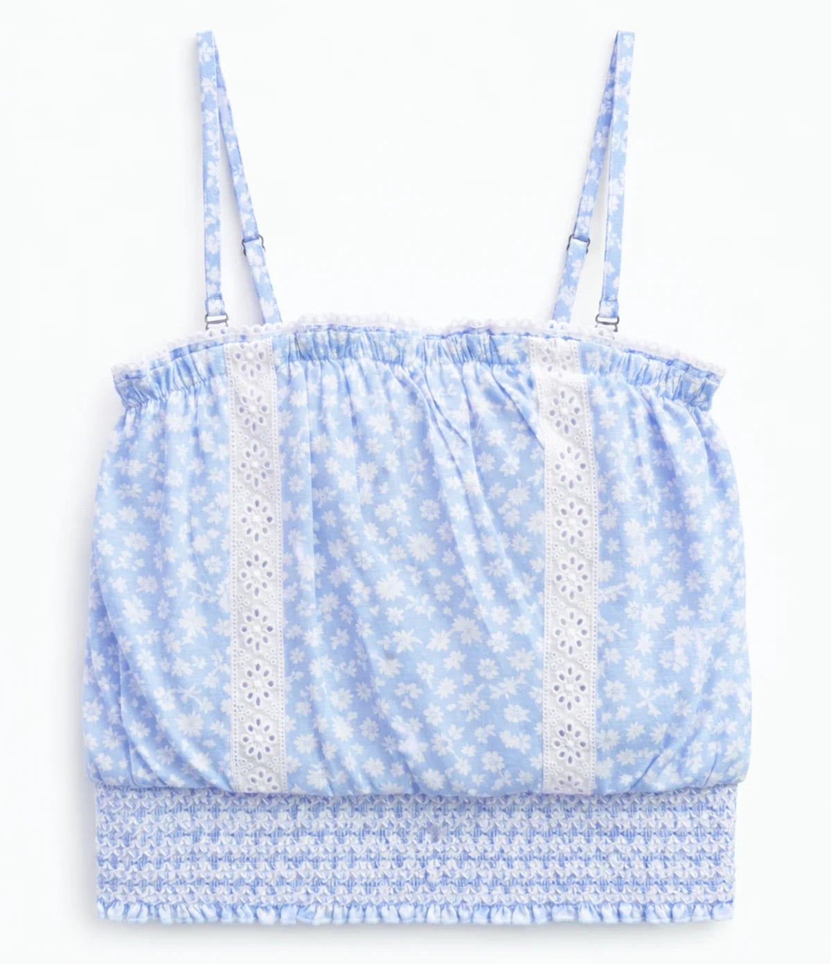 katiej blue and white floral top with eyelet trim and a smocked bottom