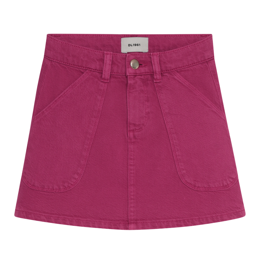 tween enim skirt features a vibrant berry-pink wash