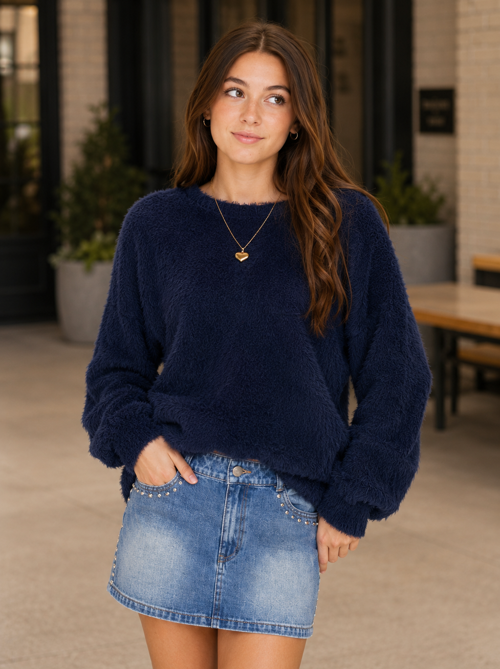 Close-up of the ultra-soft fluffy texture on the THEME NYC Maya Navy oversized sweater for tween girls, showcasing the cozy plush knit.