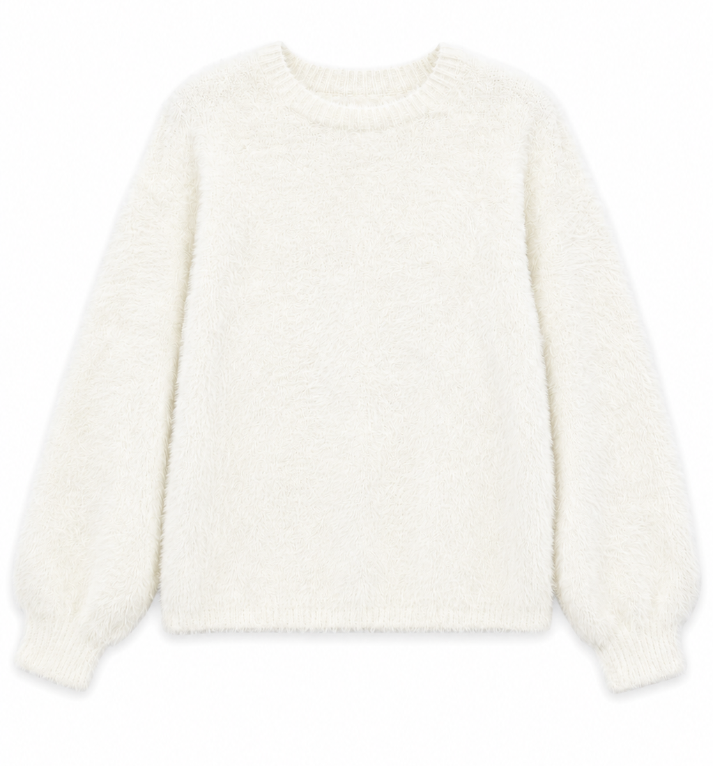 Soft fluffy oversized sweater for tween girls in neutral white ideal for pairing with satin skirts, jeans, or leggings during fall and winter.