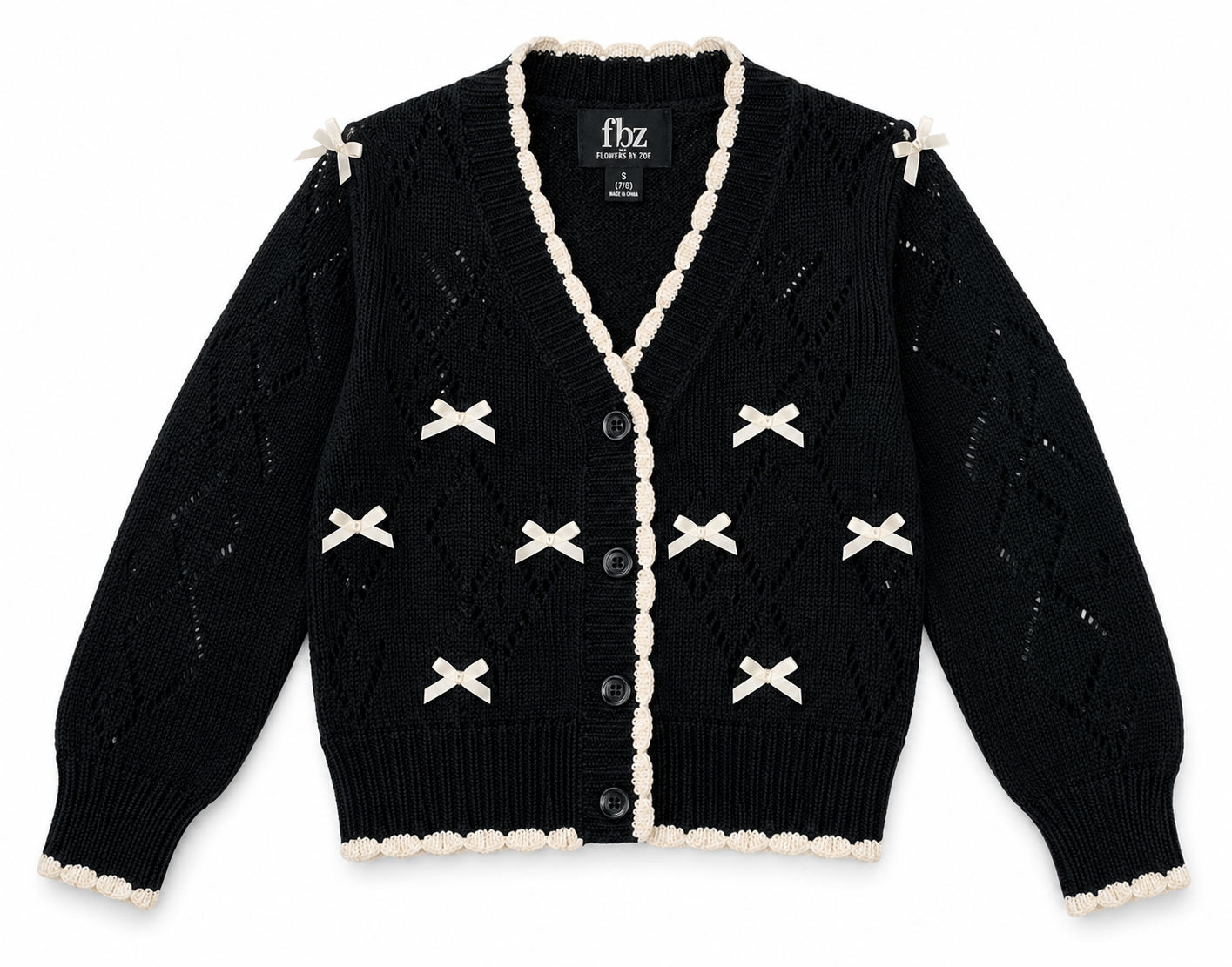 Black Flowers by Zoe cardigan with cream bows and trim styled as a preppy tween girls outfit