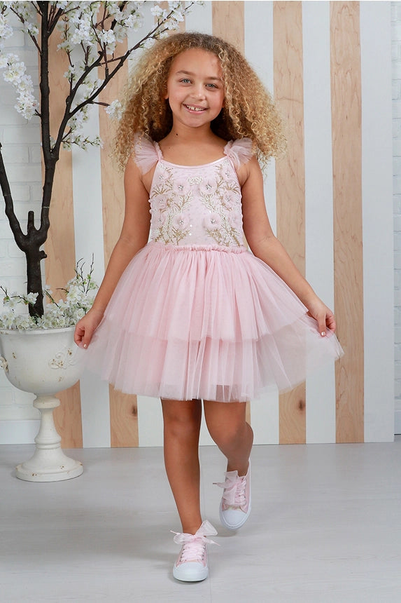 Luxury pink girls special occasion dress by Ooh! La, La! Couture with intricate hand beading, layered buttery-soft tulle, and elegant boutique styling.