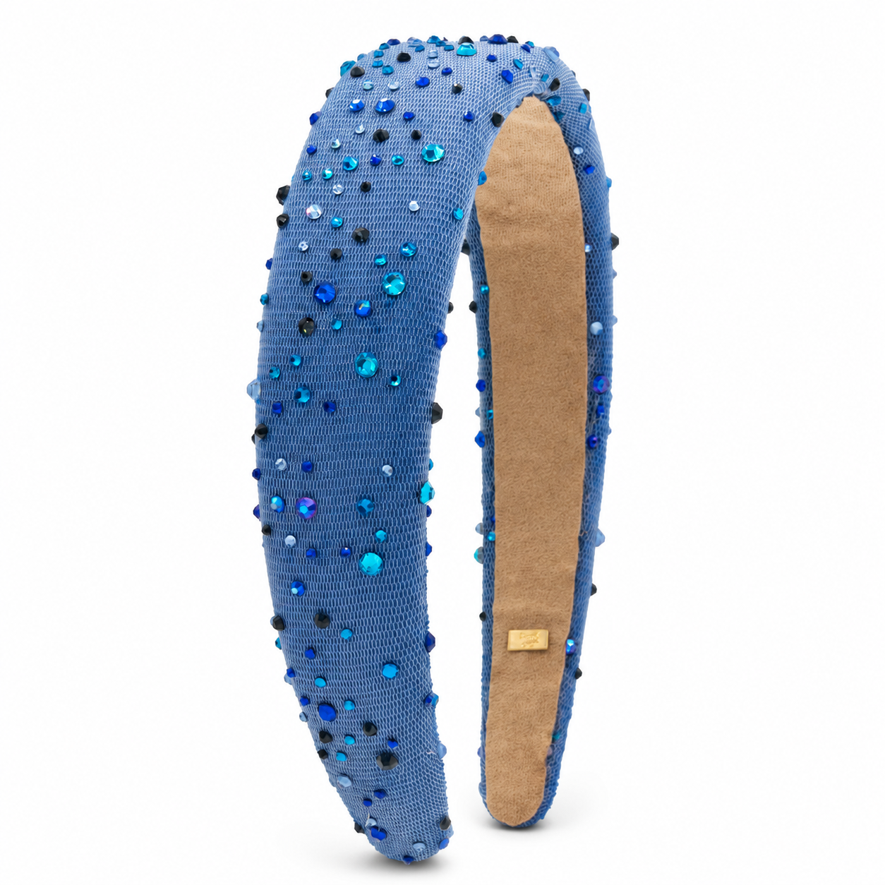 Blue Bari Lynn tulle headband scattered with sparkling rhinestones in shades of cobalt, aqua, navy, and crystal.