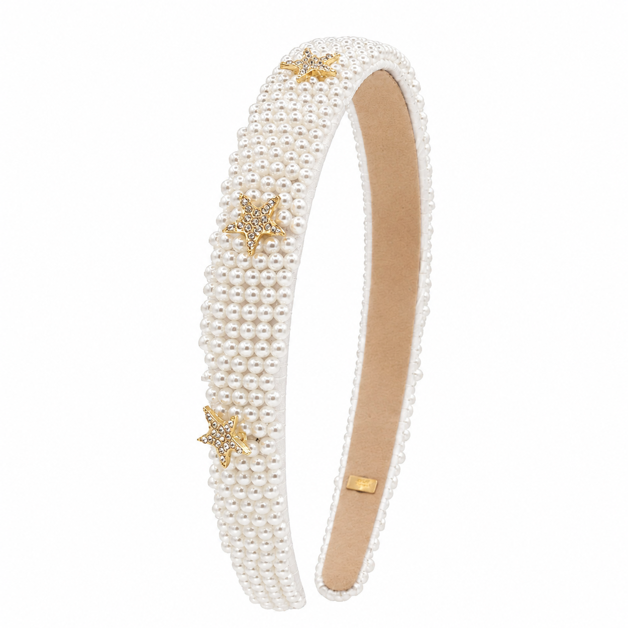 White pearl Bari Lynn headband fully covered in faux pearls and accented with sparkling gold-tone rhinestone star charms.