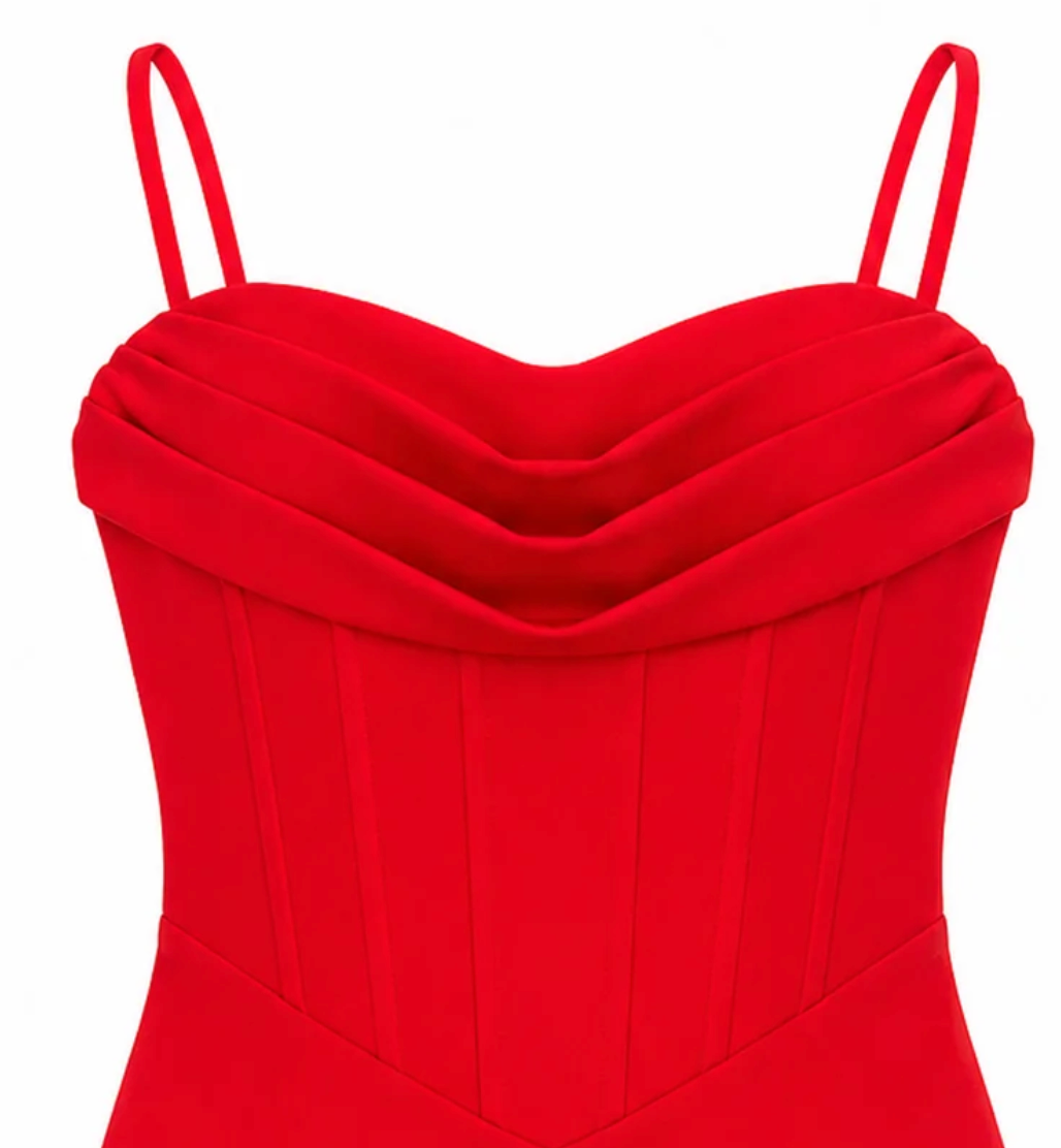 The KatieJ NYC Joelle Dress in red is shown on a tween model, highlighting its flattering body-skimming fit, structured bodice, and special occasion appeal.