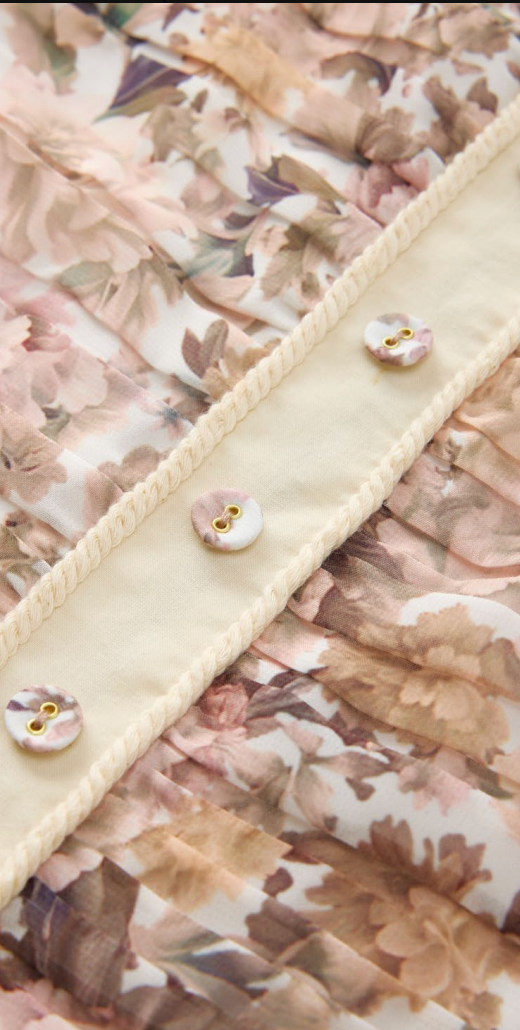 Marlo Kids Josette floral special occasion mini dress for girls with fitted ruched bodice, decorative buttons and gathered hem.