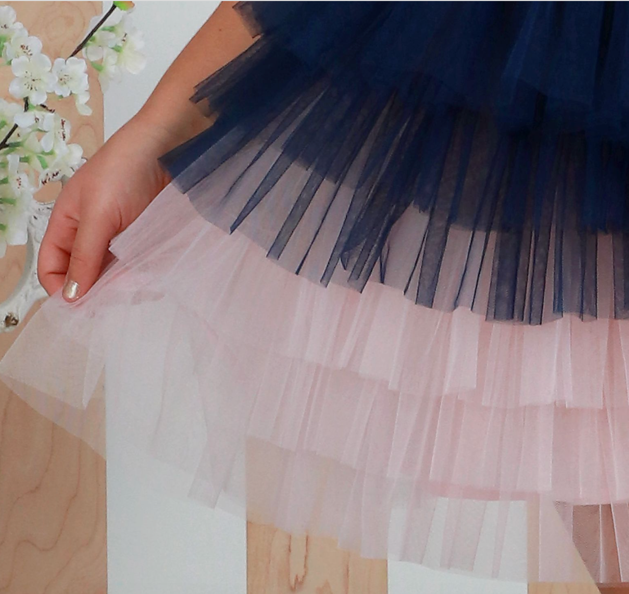 closeup of the tulle skirting on a girls' princess castle dress by Oohlala COuture