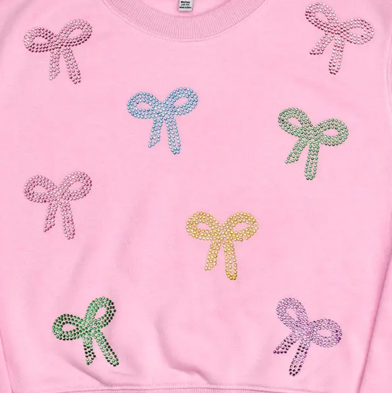 Girls sparkly bow sweatshirt in soft pink