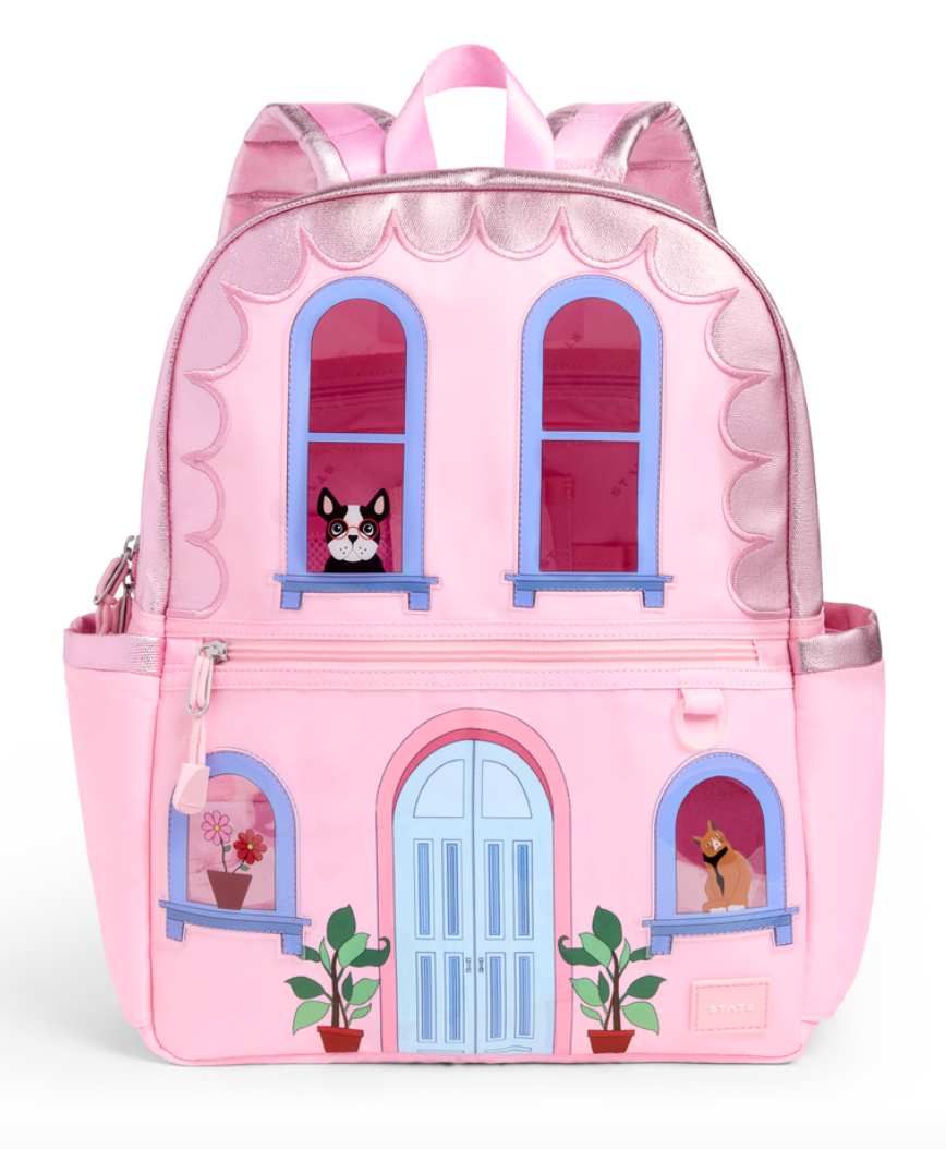 STATE Bags Kane Mini Backpack Pink House preschool backpack for girls featuring whimsical townhouse design with metallic pink accents and front storage pocket.