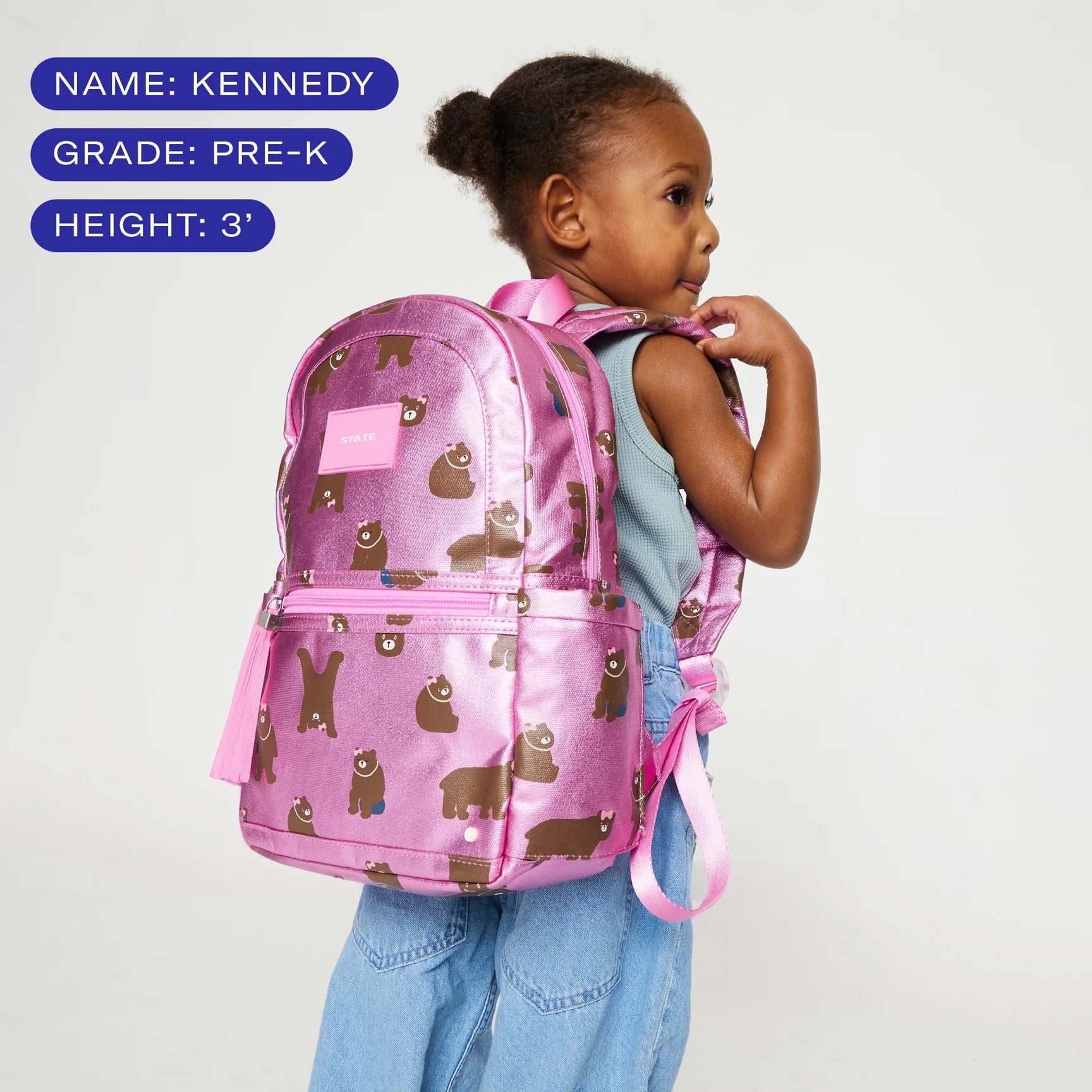 Interior view of STATE Bags Kane Mini Backpack showing spacious main compartment and organizational storage for preschool essentials.