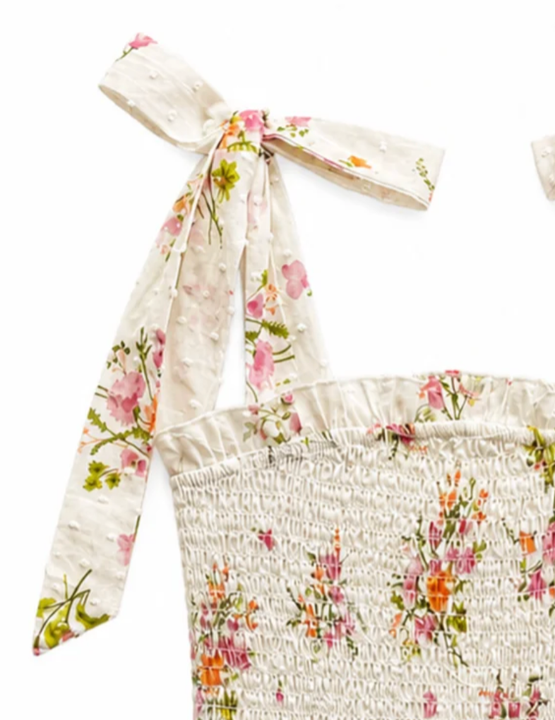 katiej emerson dress details of bow tie straps and dot printed florals with smocked bodice 
