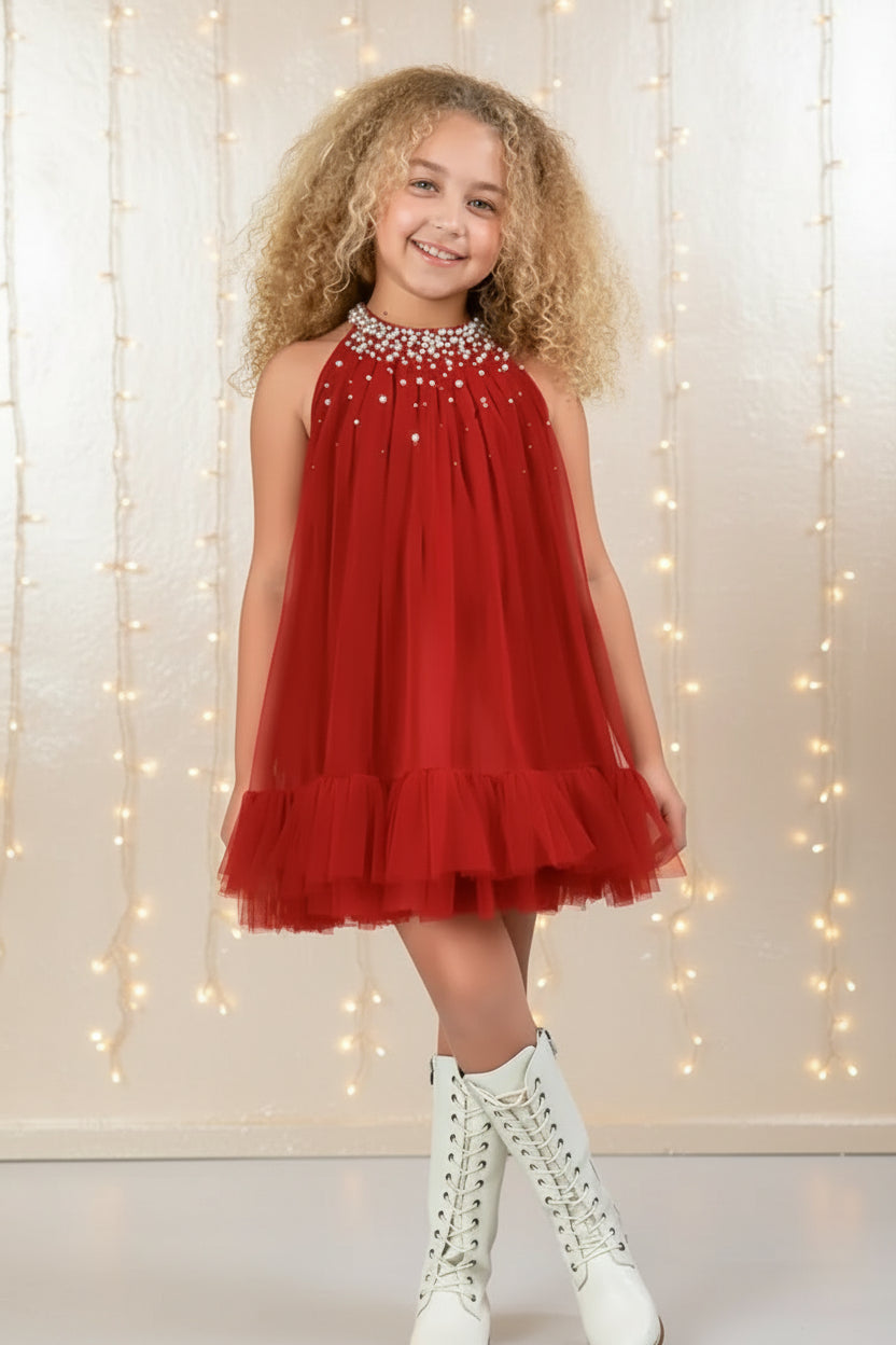 Close-up of the Ooh! La, La! Couture Solene girls' berry dress showing intricate pearl and sequin embellishments that catch and reflect the light