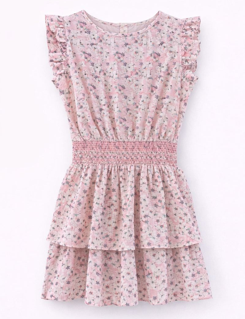 Girls pink floral school dress by Summer Loving with smocked waist and ruffled sleeves for fall and school photos.