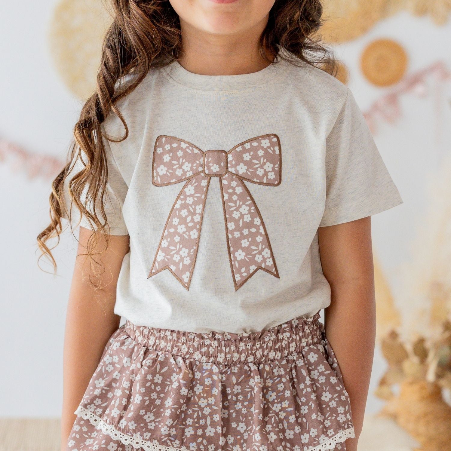 Girls Sweet Wink cotton tee with oversized mocha floral bow appliqué perfect for fall boutique outfits.