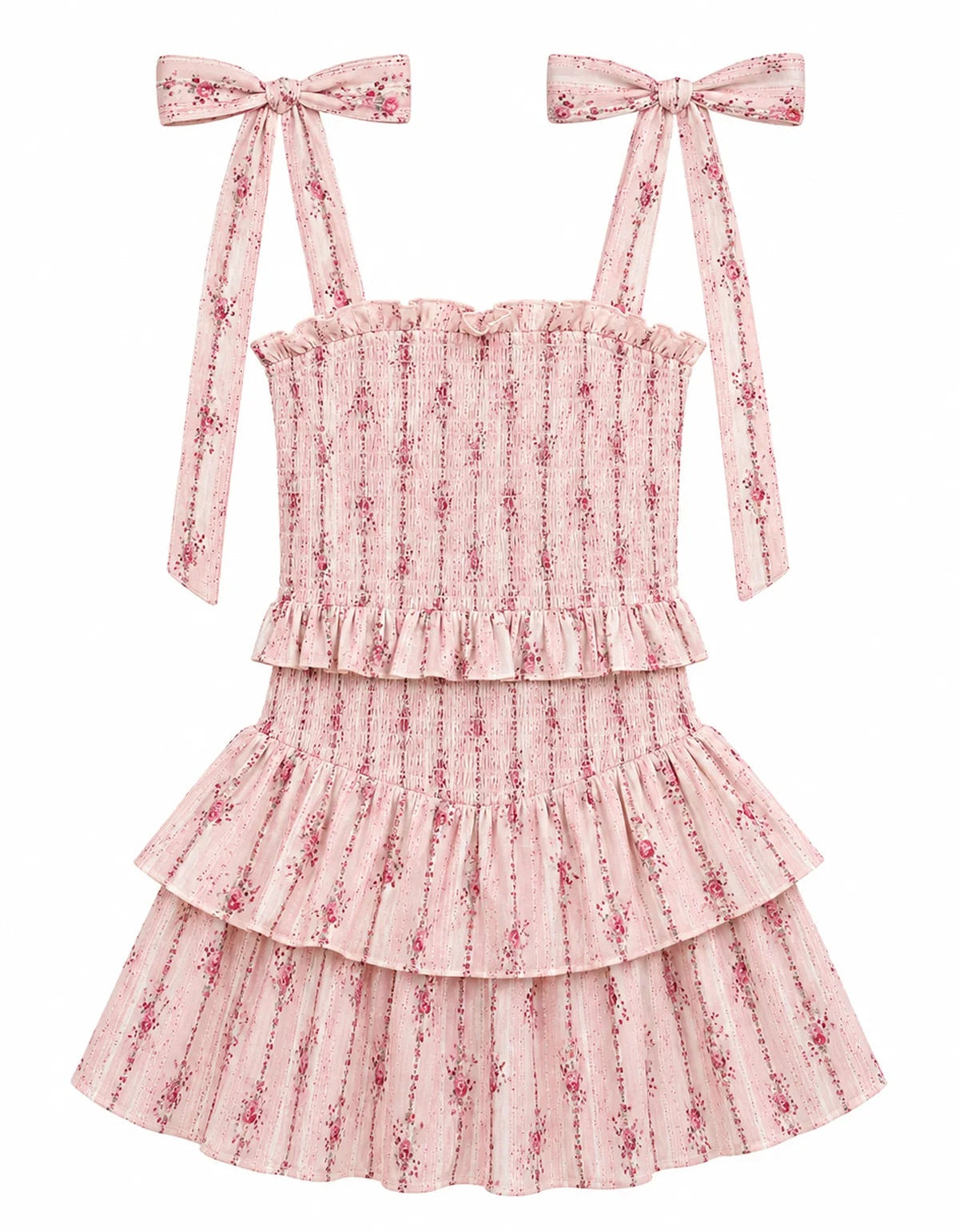 Tween girl wearing KatieJ NYC Emerson floral dress with smocked bodice and ruffled hem