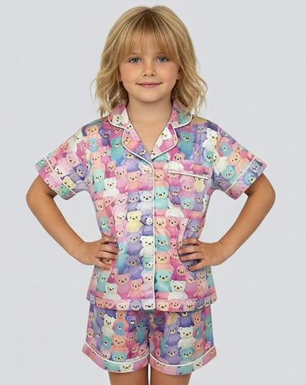 Girls satin pajama short set featuring a colorful pastel teddy bear print by Tweenstyle