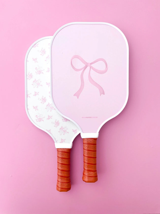 Pala de pickleball con lazo floral rosa de Coquette