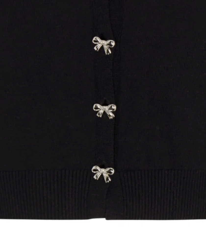 Black Gold Rush NYC Sylvie cardigan with decorative silver bow buttons for layering over dresses.