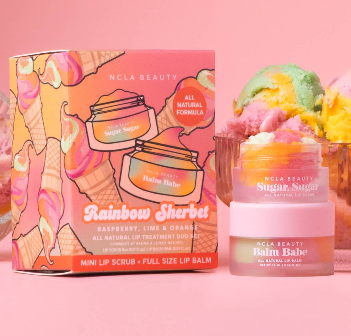 NCLA Beauty lip balm and scrub set with ice cream-themed packaging on a pink background