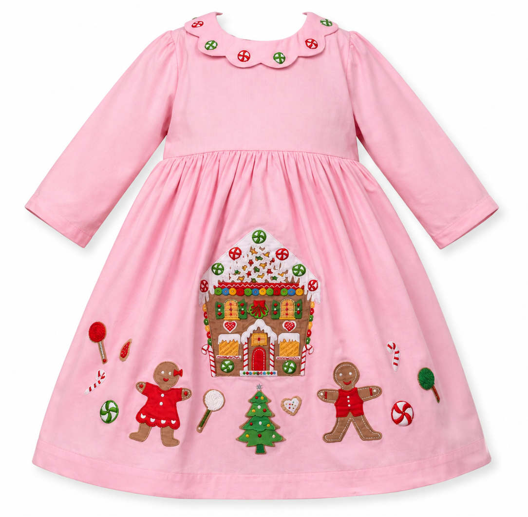 Cotton Kids pink gingerbread holiday dress with embroidered gingerbread house, candies and gingerbread girl and boy