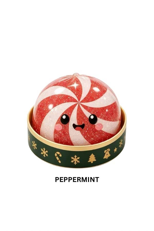 A festive peppermint-themed ornament or decorative item featuring a round red-and-white swirled candy dome with a cute face, sitting in a gold-rimmed dark green base decorated with gold holiday icons. The word 'PEPPERMINT' appears below on a white background.