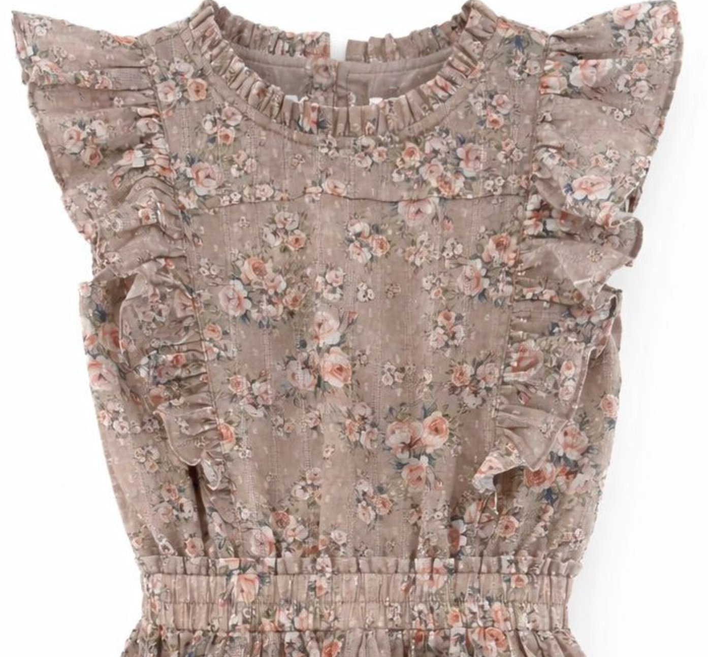 A close-up of a ruffled sleeveless top or dress in a dusty taupe-beige fabric with an all-over small floral print in muted pink, peach, and blue tones, finished with a smocked waistband.