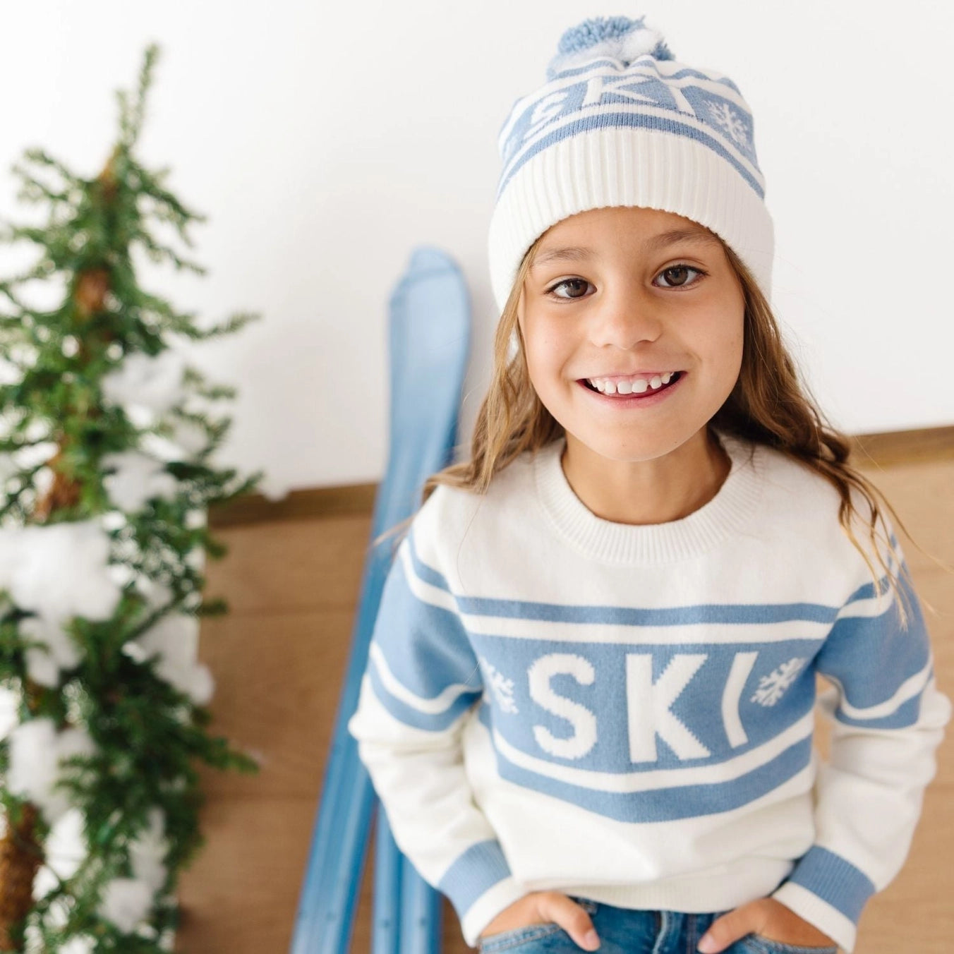 Sweet Wink Ski Intarsia Sweater modeled with matching hat