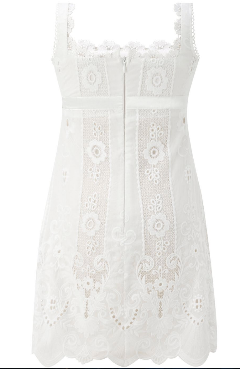 tween girls ivory sleeveless lace dress with floral eyelet embroidery, a front zipper, and a scalloped hem on a white background.