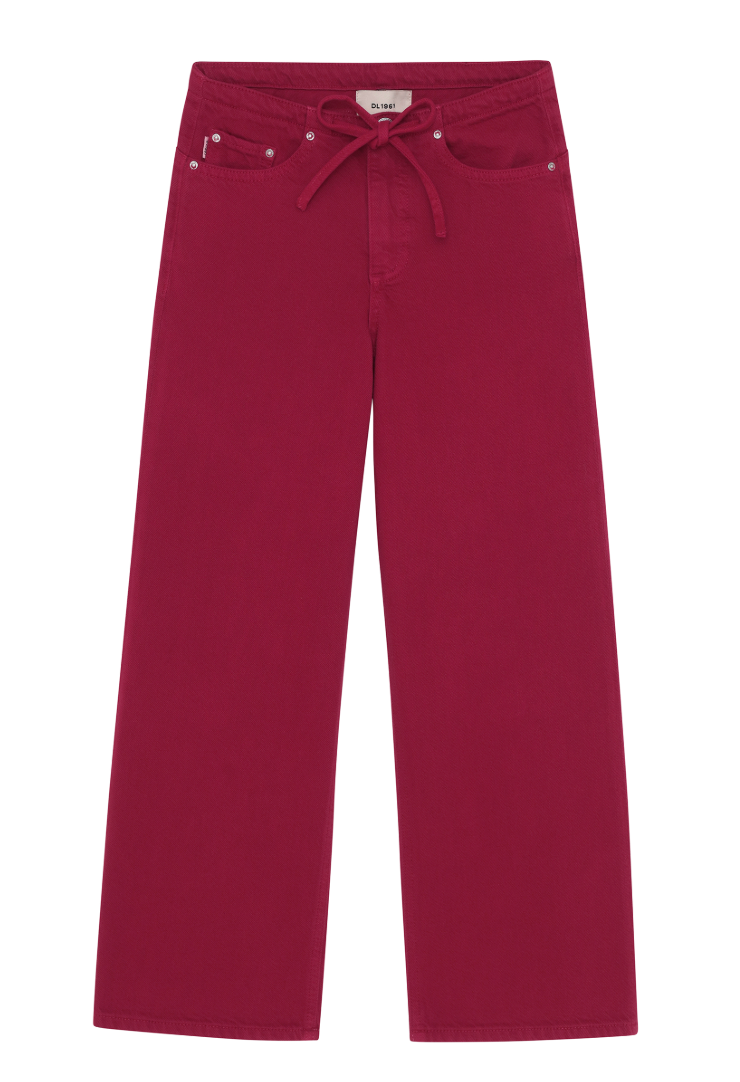 A pair of wide-leg denim pants in a deep magenta or raspberry blue, featuring a drawstring waistband, front pockets, and silver rivets, shown flat on a white background.