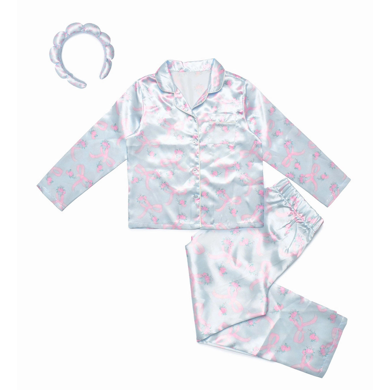 A two-piece satin lounge set in light blue with a pink ribbon and floral pattern, shown with a matching pink bow headband on a white background.