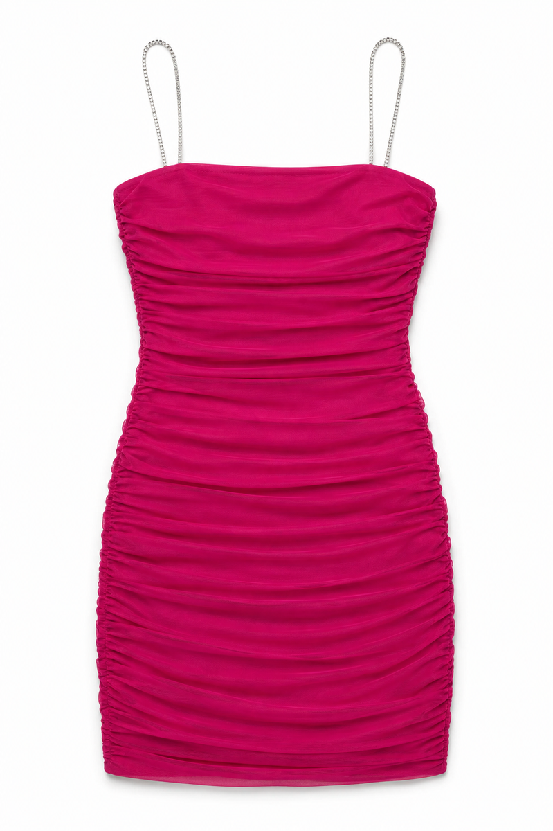 A tween girls bright fuchsia pink ruched mini dress with thin silver chain straps, shown against a plain white background.