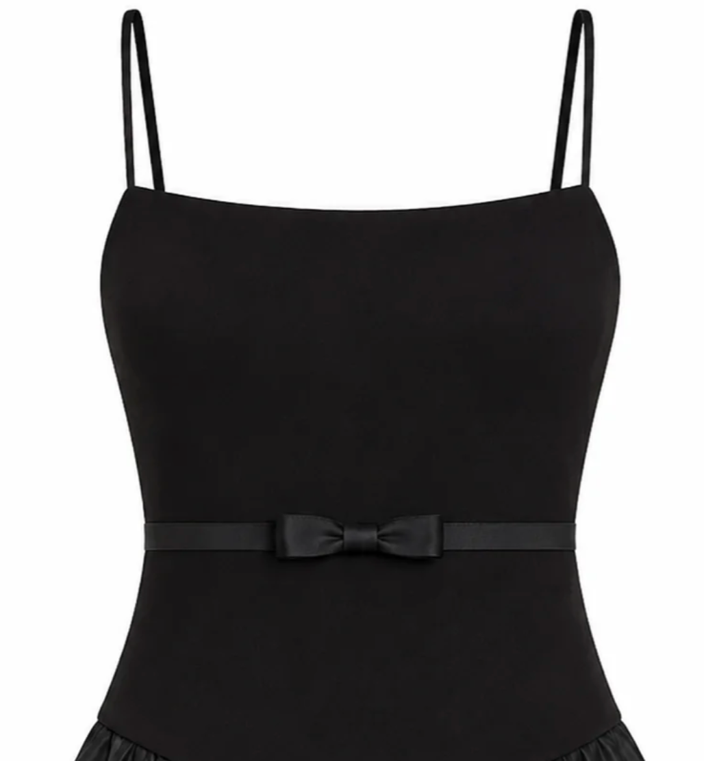 closeup bodice and bow detailing of a tween girls black party dress from katiej nyc 